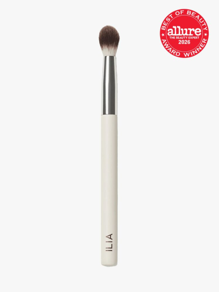 Ilia Beauty Blending Brush in branded component on a light gray background with the 2026 best of beauty seal in the top right corner
