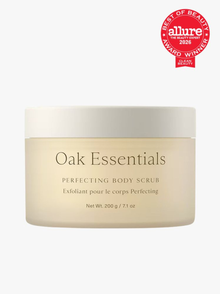 Oak Essentials Perfecting Body Scrub in branded tub component on a light gray background with the 2026 best of beauty clean beauty seal in the top right corner
