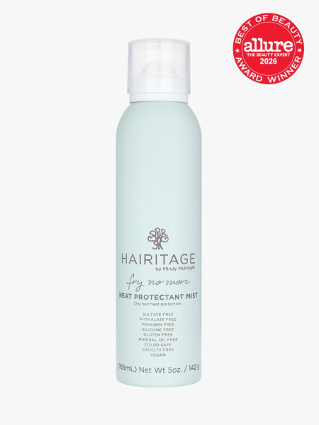 Mint colored spray bottle of Hairitage By Mindy McKnight Fry No More Heat Protectant Mist with clear cap and an Allure Best of Beauty stamp in the top right corner on a light gray background