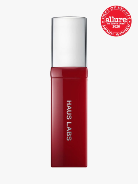 Haus Labs Atomic Shake Lip Lacquer with a silver cap and an Allure Best of Beauty stamp in the top right corner on a light gray background