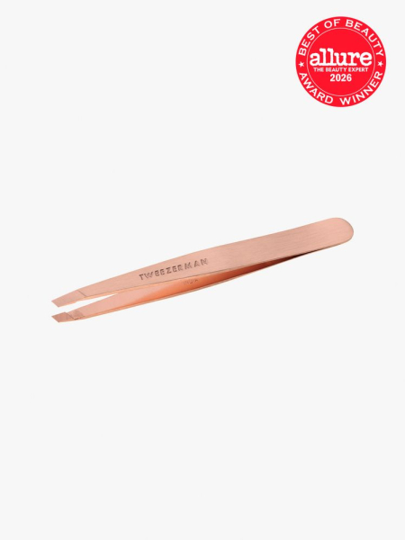 Tweezerman Slant Tweezer in branded component on a light gray background with the 2026 best of beauty seal in the top right corner