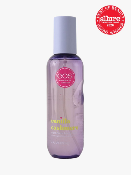 Purple spray bottle of Eos Vanilla Cashmere Body Mist with purple cap and an Allure Best of Beauty stamp in the top right corner on a light gray background